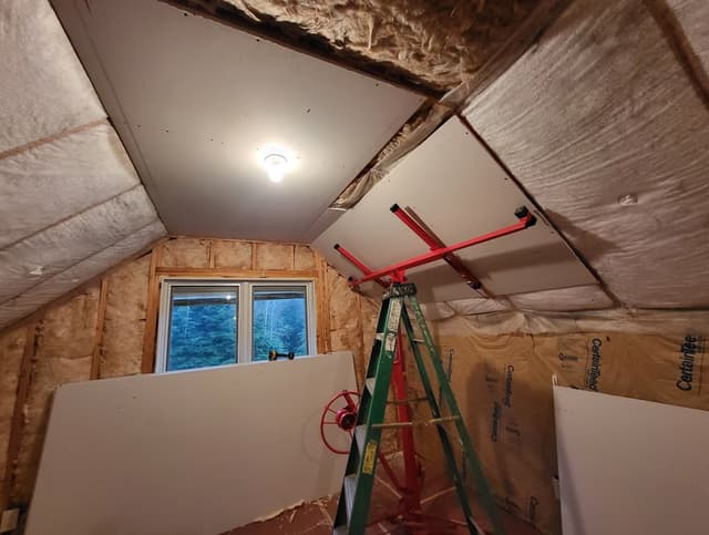 hanging drywall in progress