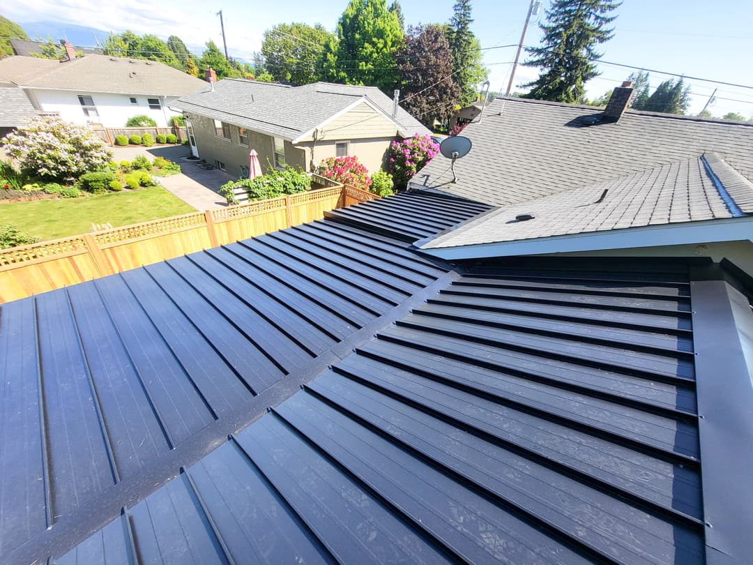 A metal and shingle roof